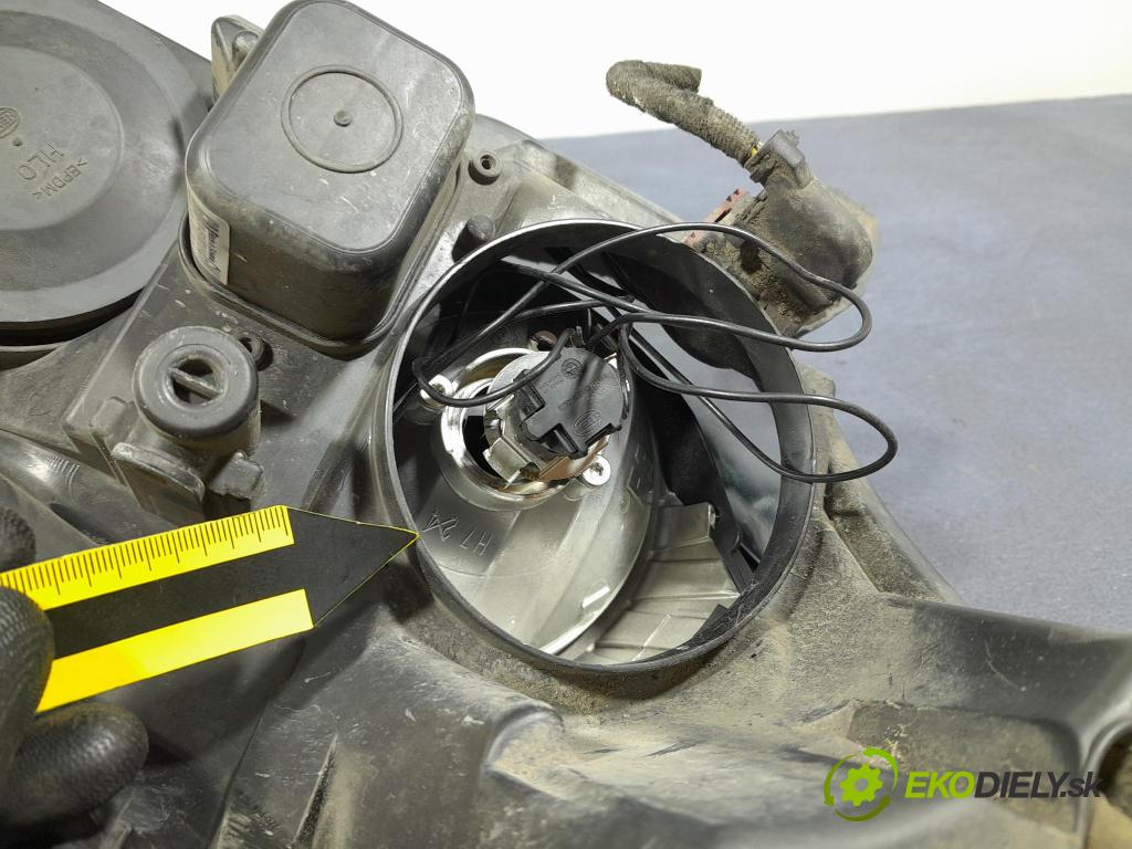 Opel Astra 2006 světlo Levý: 24451032